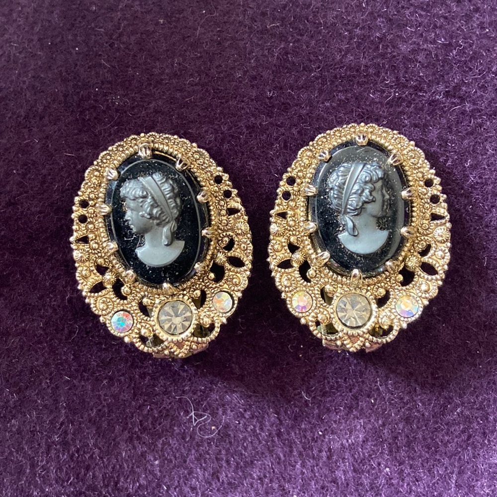 Cameo clip-on earrings. Beautiful black, 3-D cameos with rhinestone accents.